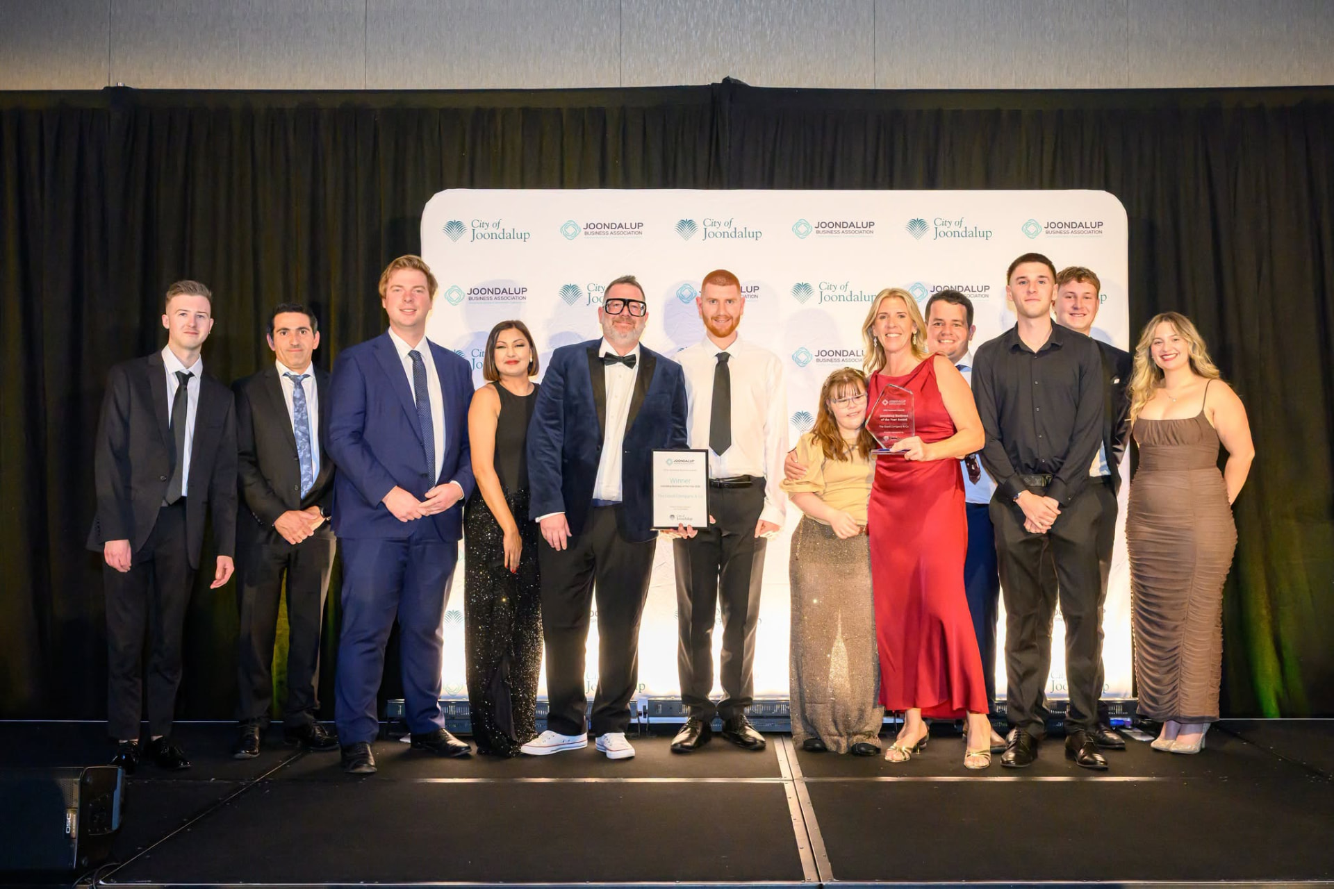 Business of the Year award winners on stage at the JBA awards